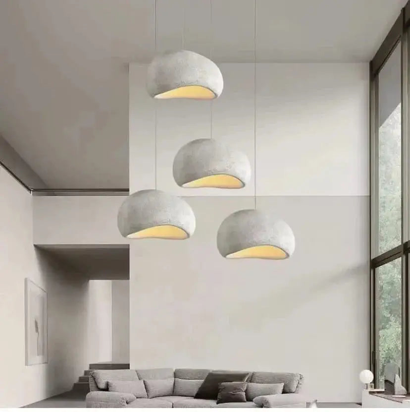 Wabi Sabi pendant light LED ceiling lamp in modern living room with four dome-shaped fixtures. Ideal for minimalist home decor and ambient lighting.