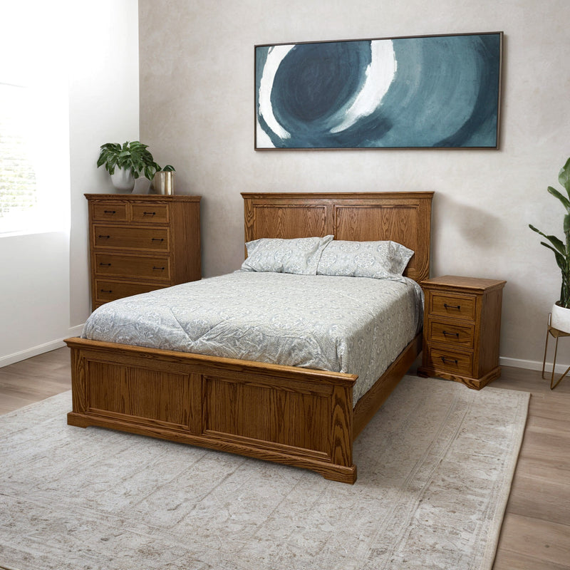 Dublin D470 Solid 5 Piece Oak Rail Bed in dark oak finish, styled in a modern bedroom with matching tall chest and nightstand. Ideal for transitional interiors.