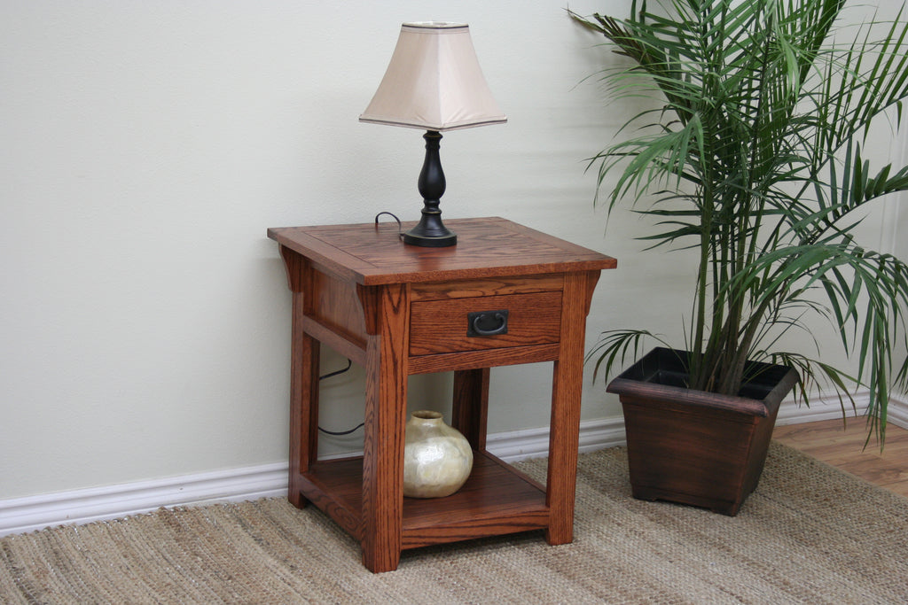 Mission O-M258 Oak End Table with drawer and shelf, shown in a living room setting with lamp and decor, solid wood Mission-style furniture.