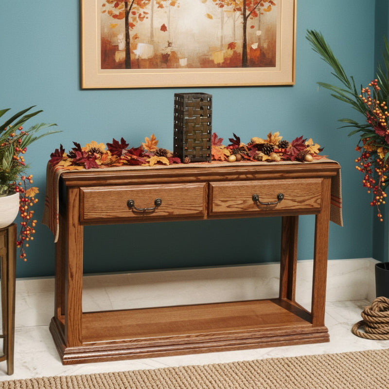 Traditional Oak Sofa Console Table O-T247 decorated with autumn leaves and floral accents, highlighting its warm oak finish and classic craftsmanship.