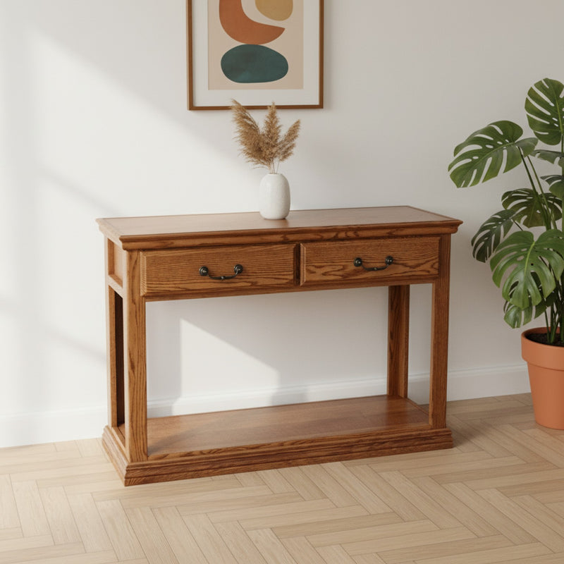 Traditional Oak Sofa Console Table O-T247 in a sunlit room with herringbone flooring and potted plant, highlighting its handcrafted American-made quality.