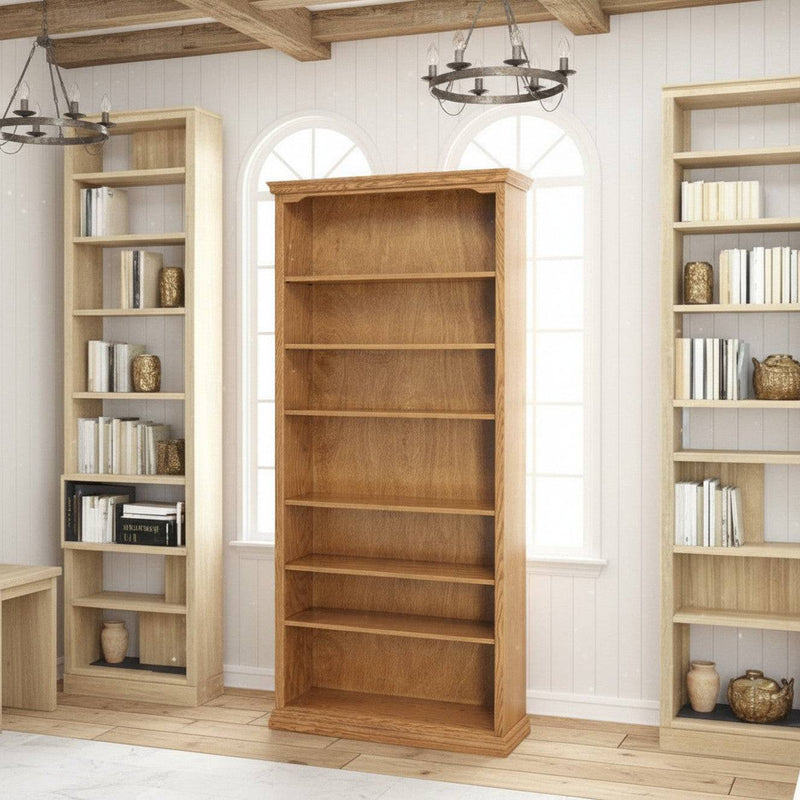 Natural oak bookshelf in a room with windows and decorative pottery
