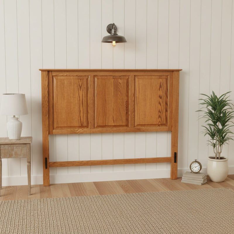 Traditional T471 Solid Oak Flat Panel Headboard ONLY shown freestanding against a white shiplap wall, highlighting its 3 raised panel design.