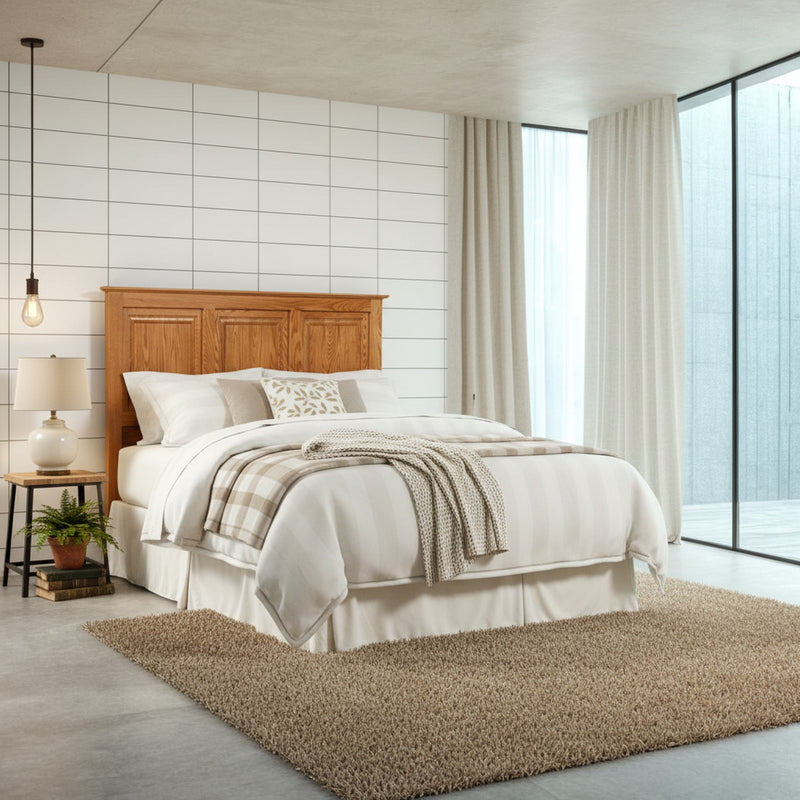 Traditional T471 Solid Oak Flat Panel Headboard ONLY in a medium oak tone, featured in a modern bedroom with white bedding and wood accents.