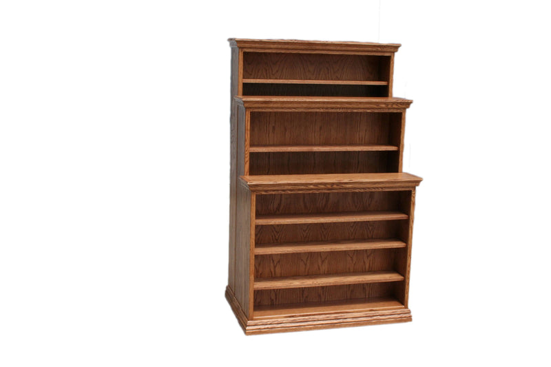Wooden bookshelf with adjustable shelves in a home office setting