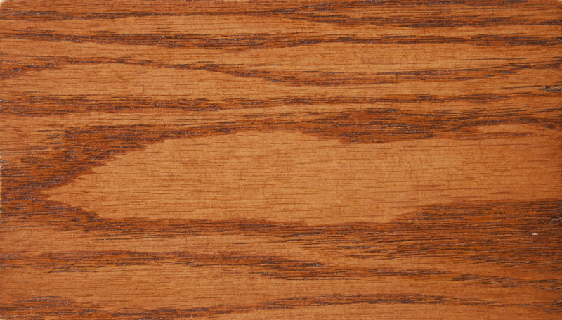 Close-up of Traditional T641 Office Desk & Return wood finish in warm reddish-brown oak, showcasing natural grain for office furniture appeal.